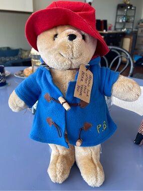 Plush Toy in Blue Coat and Red Hat